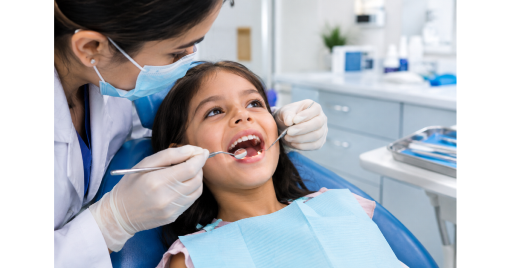 Child receiving a regular dental checkup