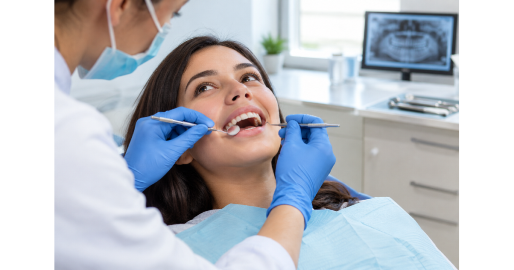 Routine dental checkup with a dentist examining a patient's teeth